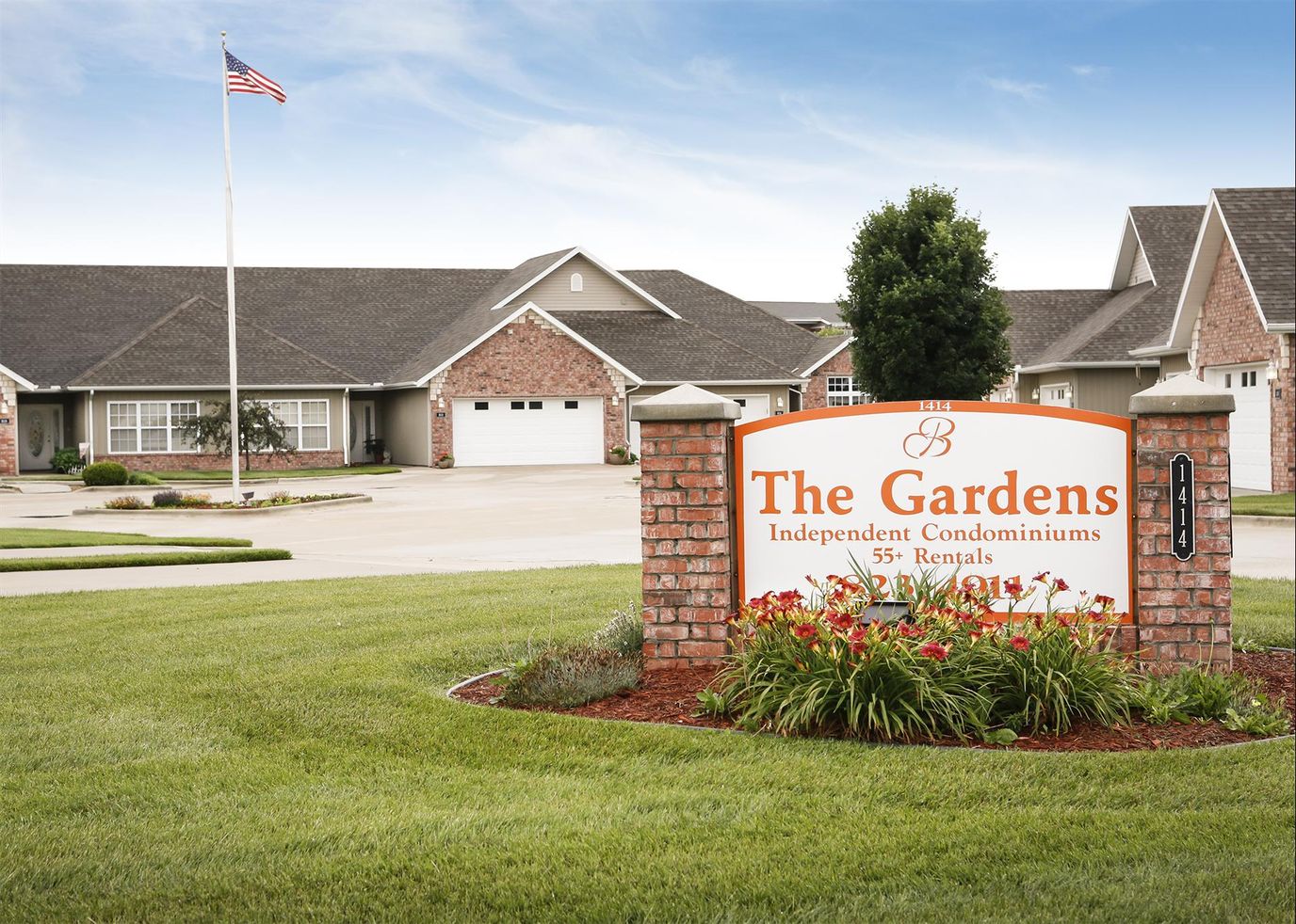 Exterior view of The Gardens Independent Condominiums entrance sign