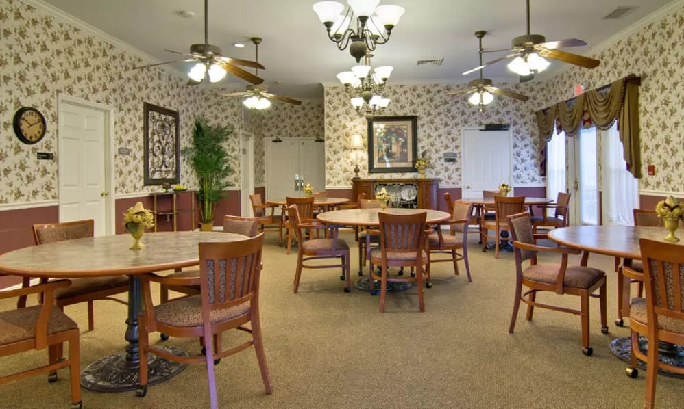 Bright dining room with tables and chairs