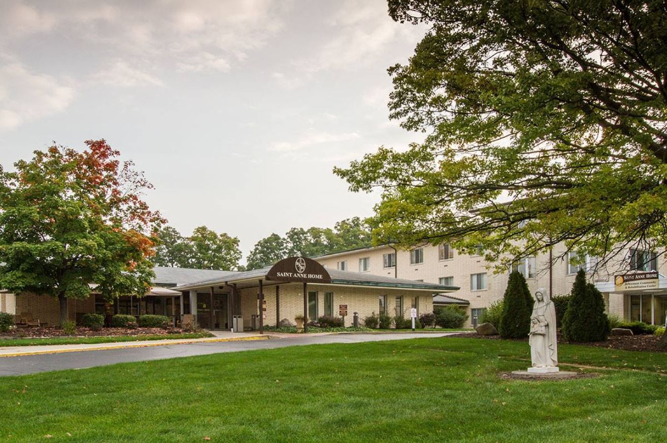 Exterior view of Saint Anne Home with landscaped grounds