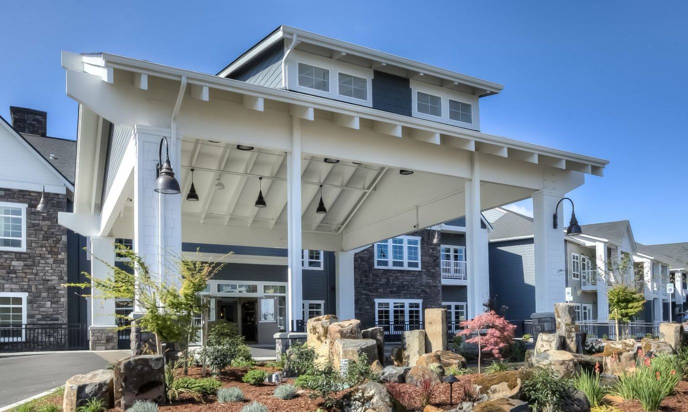 Entrance of Waterford Grand with landscaped garden