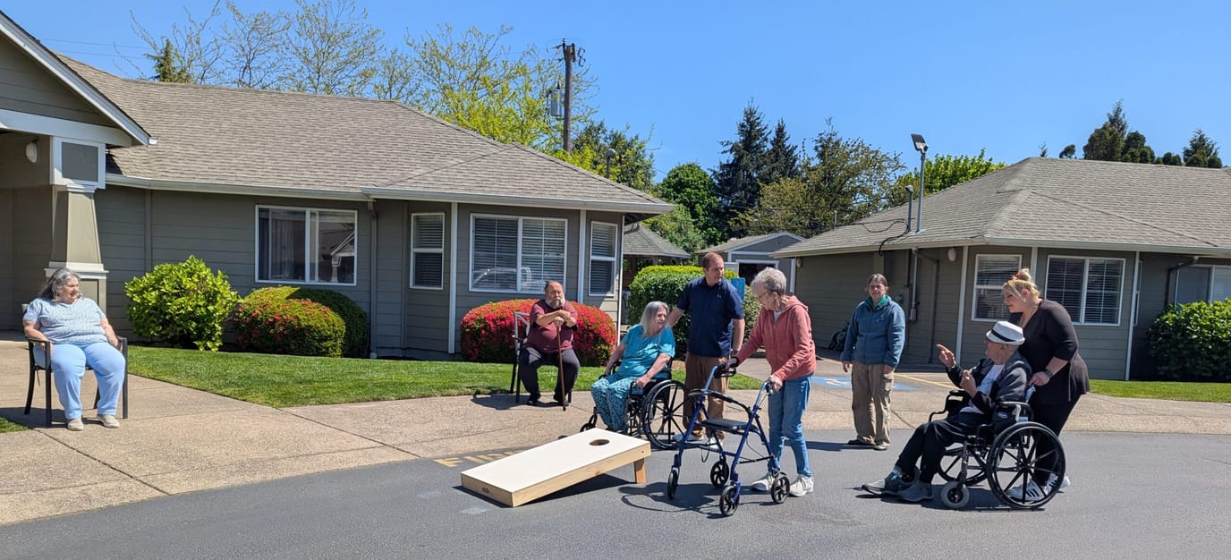 Residents participating in an outdoor game activity