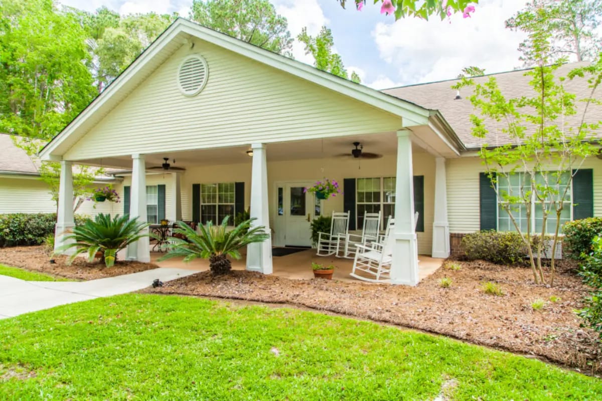 Exterior view of a senior living facility with porch