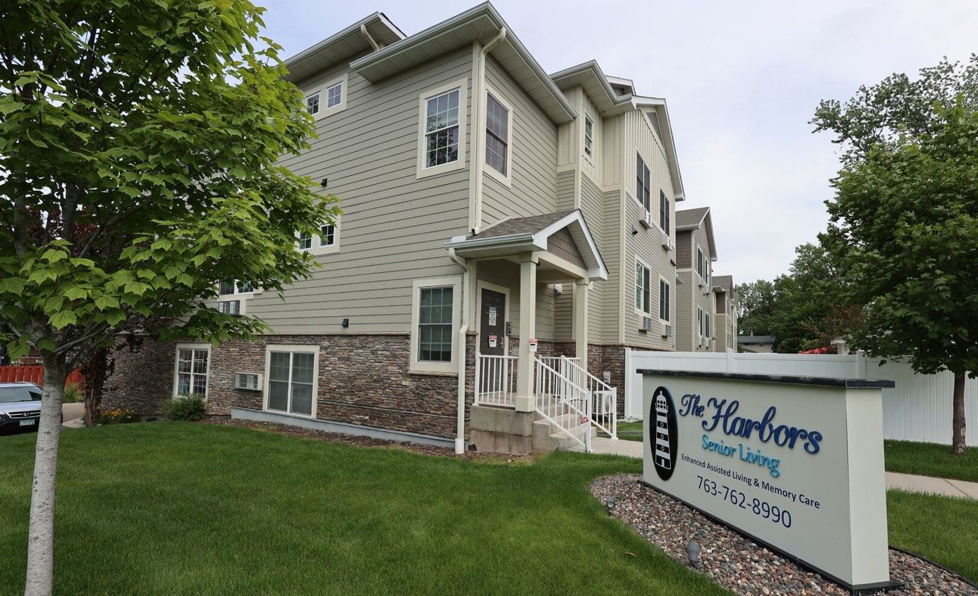 Exterior view of The Harbors Senior Living building
