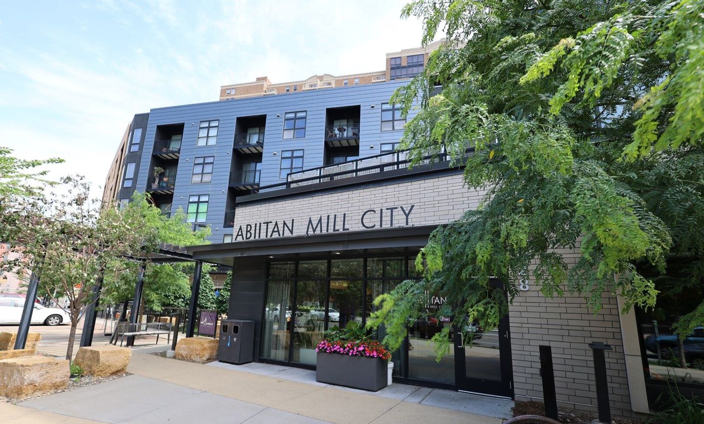 Exterior view of Abitaan Mill City senior living entrance