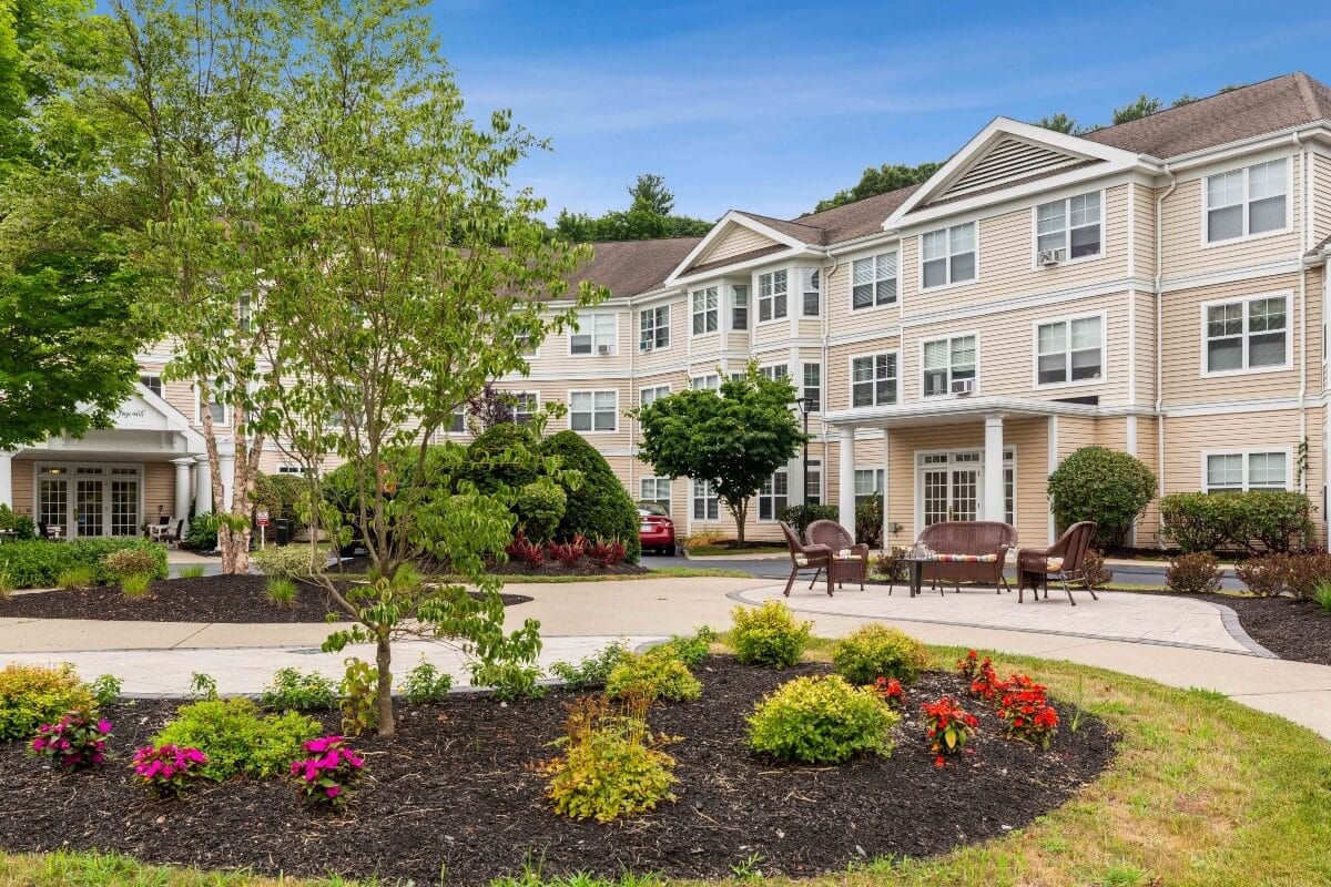 Exterior view of a senior living facility garden area