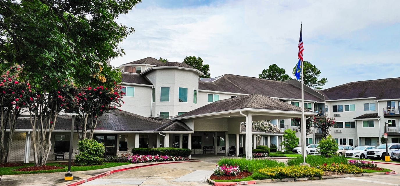 Exterior view of Whealdon Estates with landscaped entrance