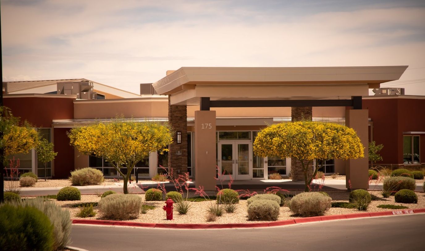 Exterior view of the facility with landscaping