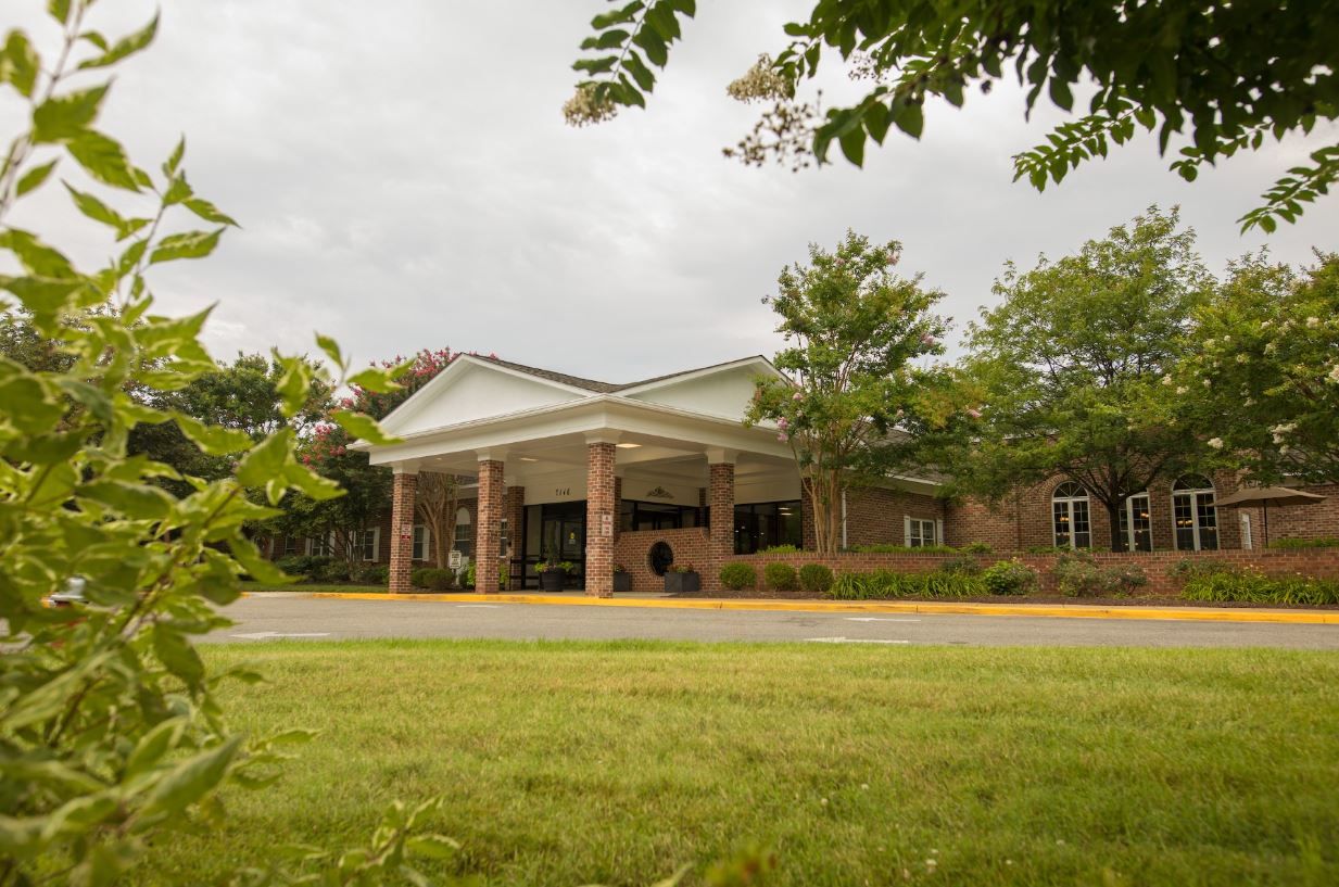 Exterior view of Paul Spring Community building with landscaping