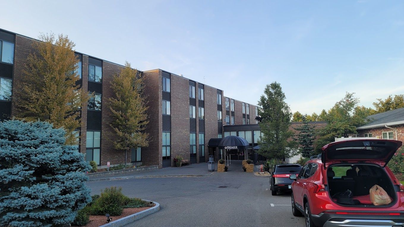 Exterior view of the facility with parking area