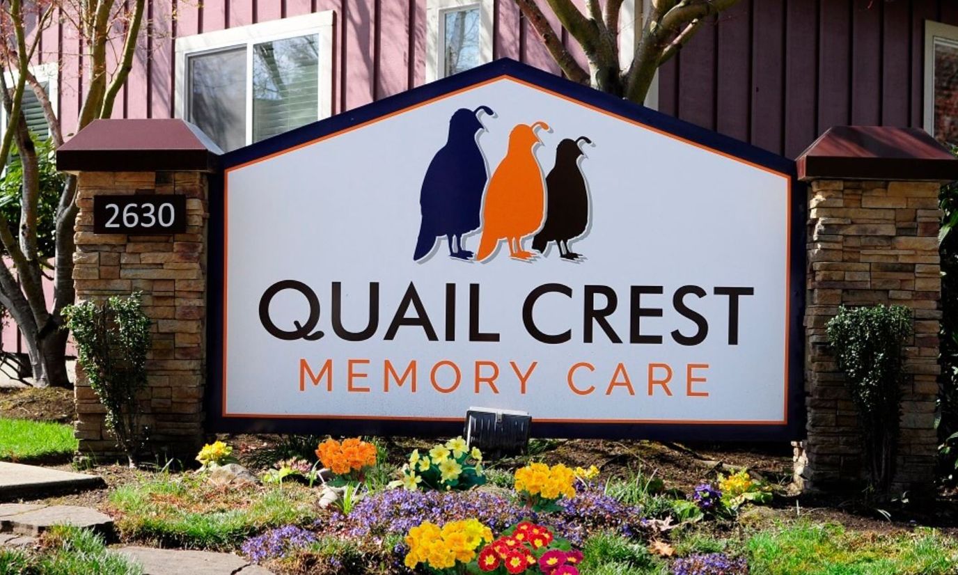 Facility logo with colorful design and flowers