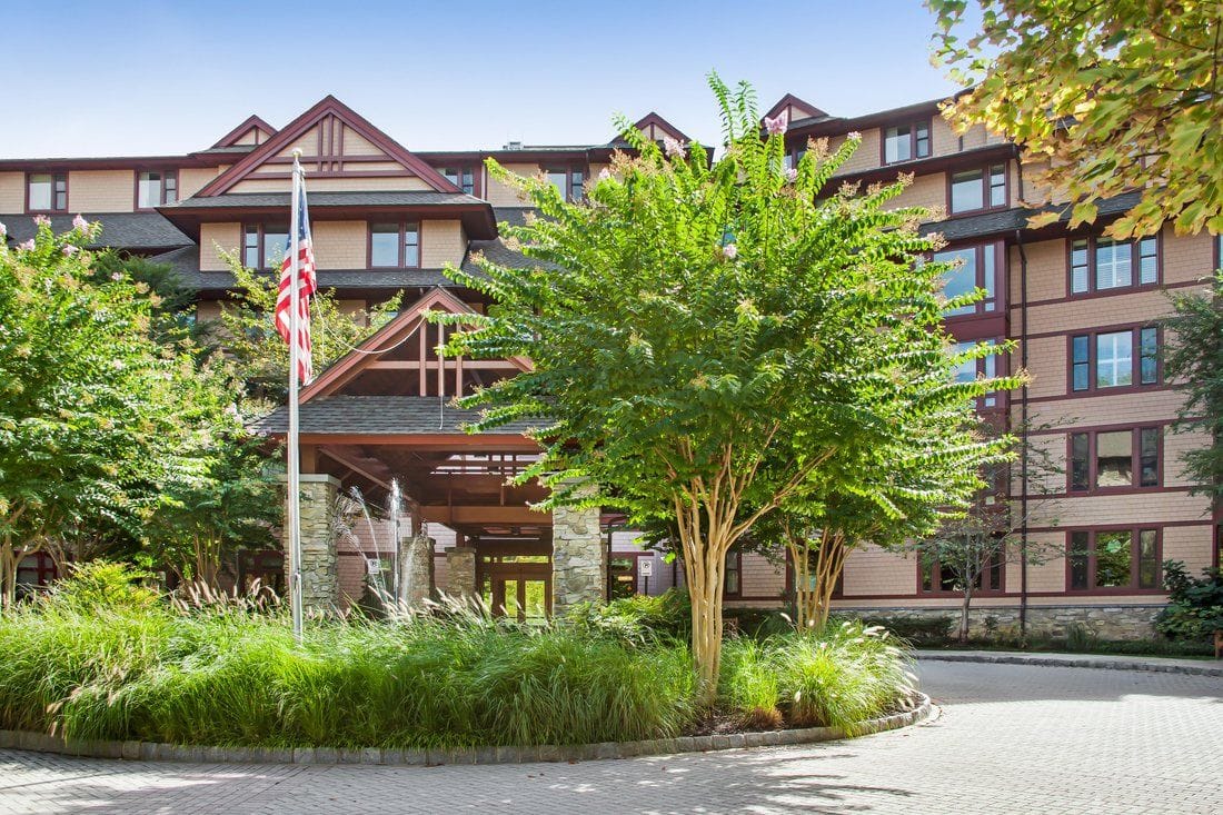 Exterior view of Sunrise at Fox Hill with greenery
