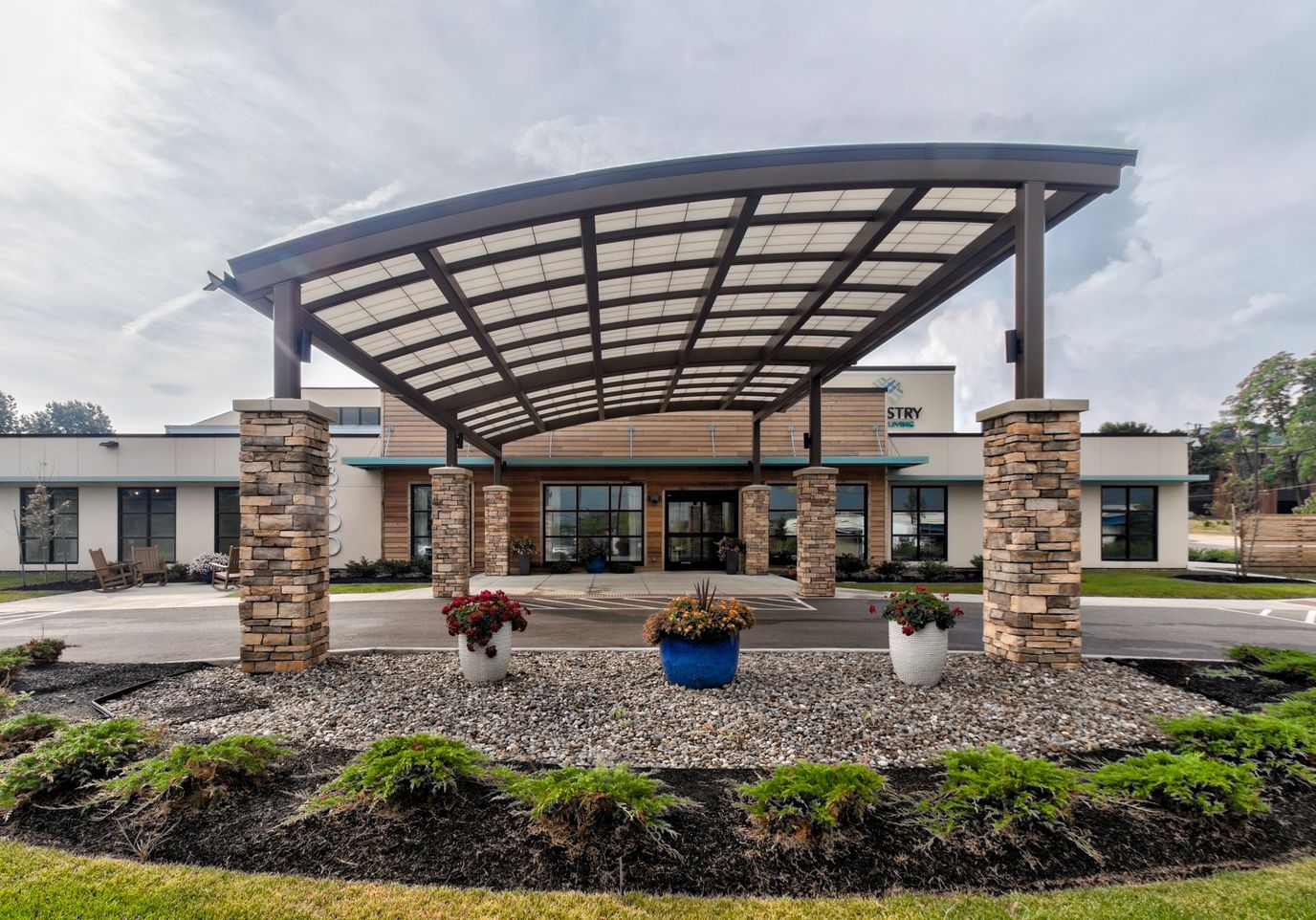 Exterior view of the Tapestry Senior Living facility entrance
