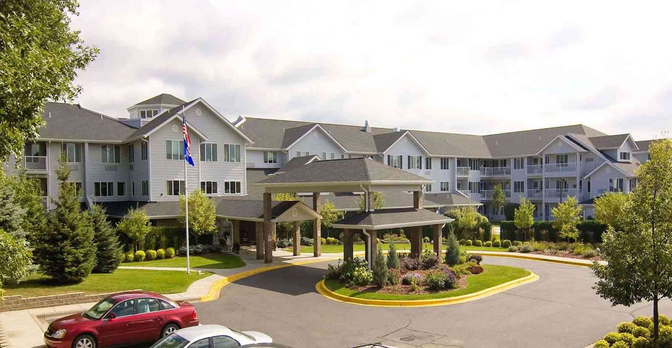Exterior view of The Lodge at White Bear with landscaping