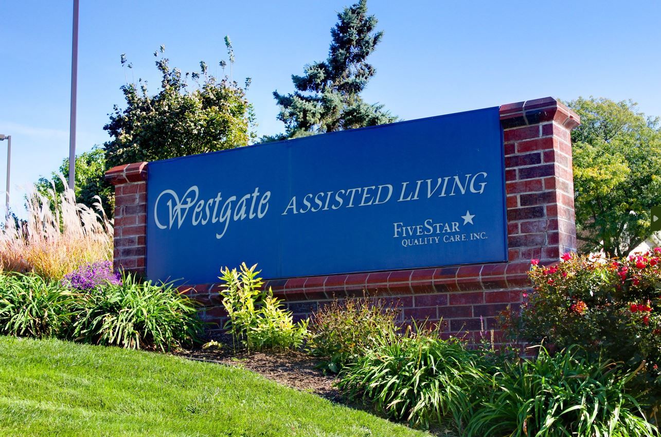 Sign for Westgate Assisted Living with landscaping