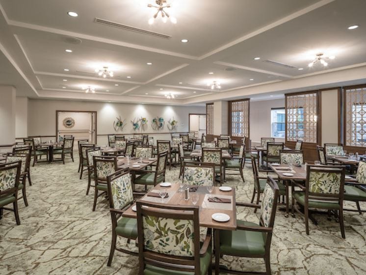 Dining room with tables set for meals