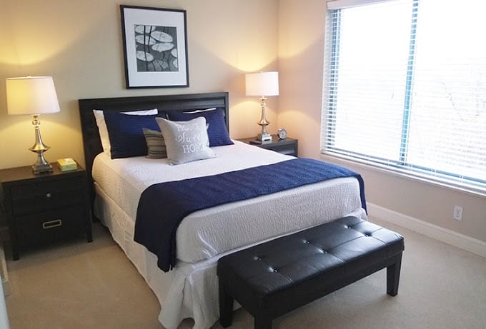 Cozy resident room with bed and natural light