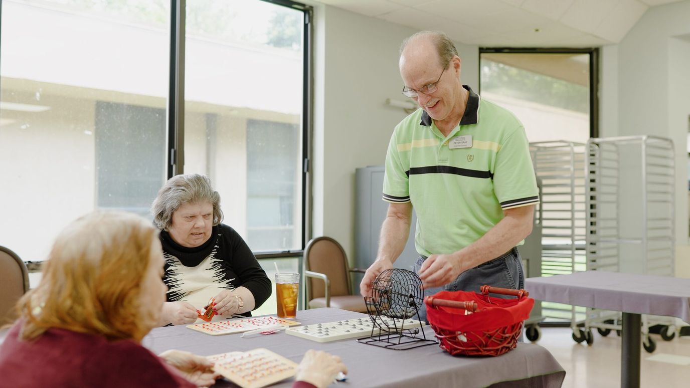 Windcrest Health and Rehabilitation, Nursing Home in Springdale, AR — Residents playing bingo in a common area