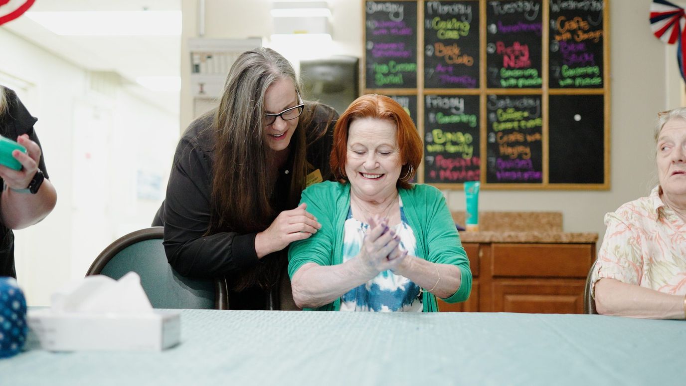 Windcrest Health and Rehabilitation, Nursing Home in Springdale, AR — Residents and staff enjoying time together in a common area