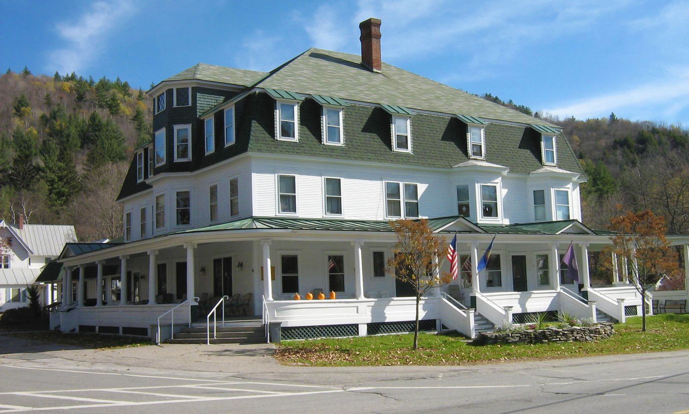 Exterior view of a senior living facility on a sunny day