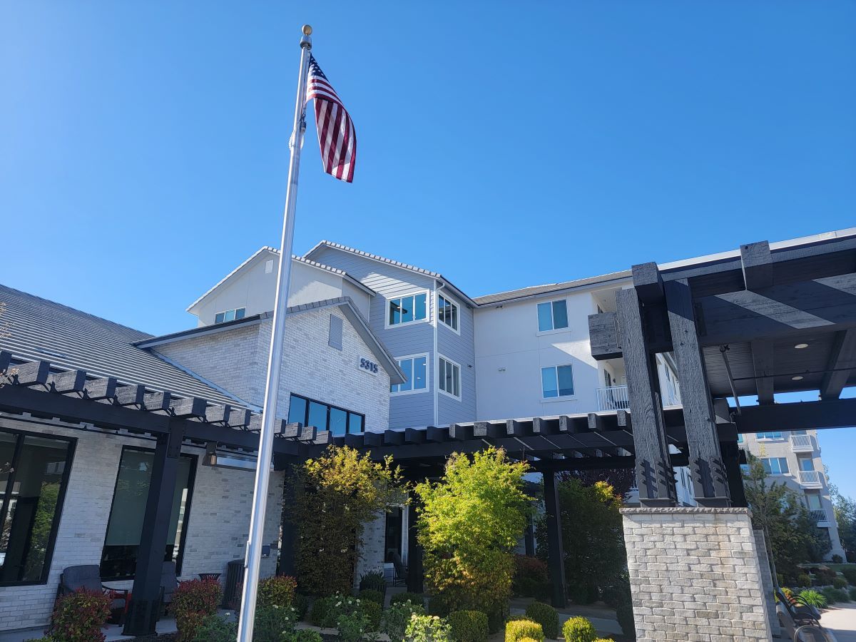 Exterior view of the facility with American flag