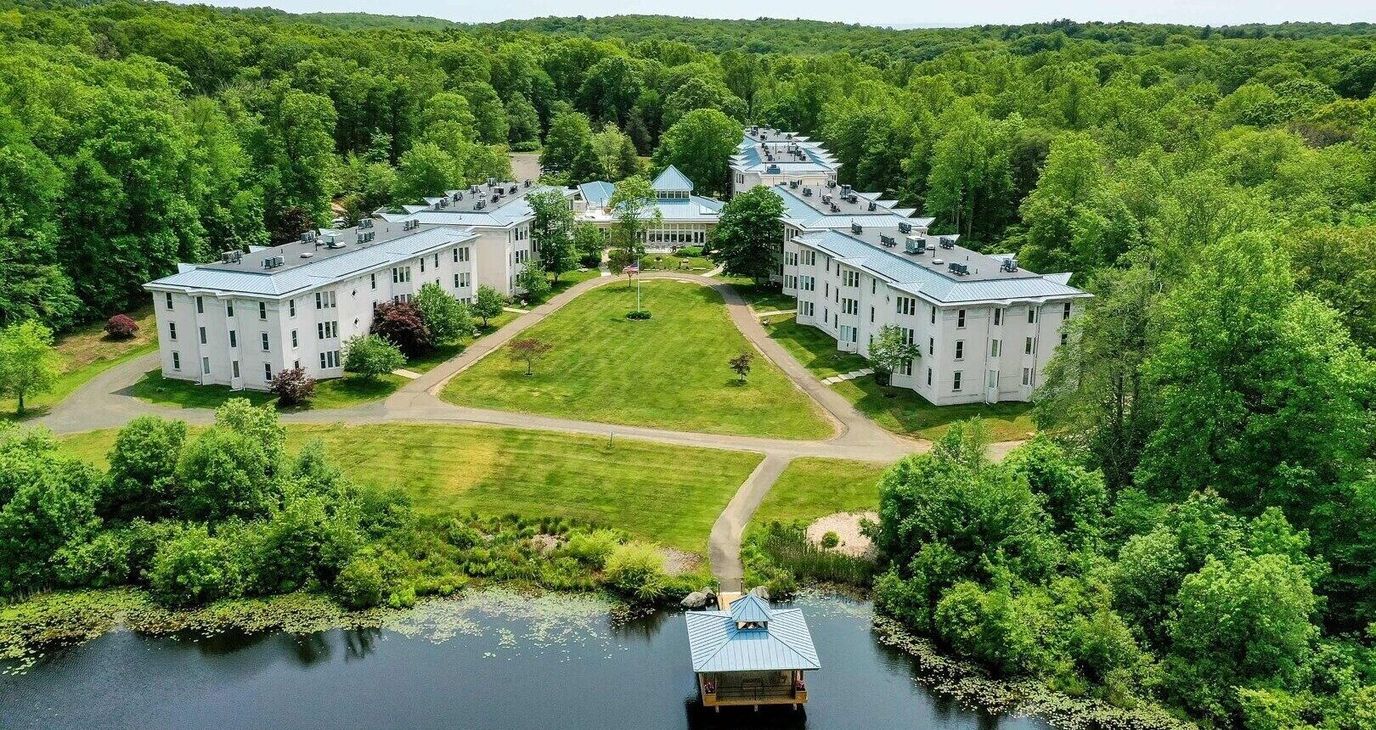 Aerial view of Solstice Senior Living campus surrounded by greenery