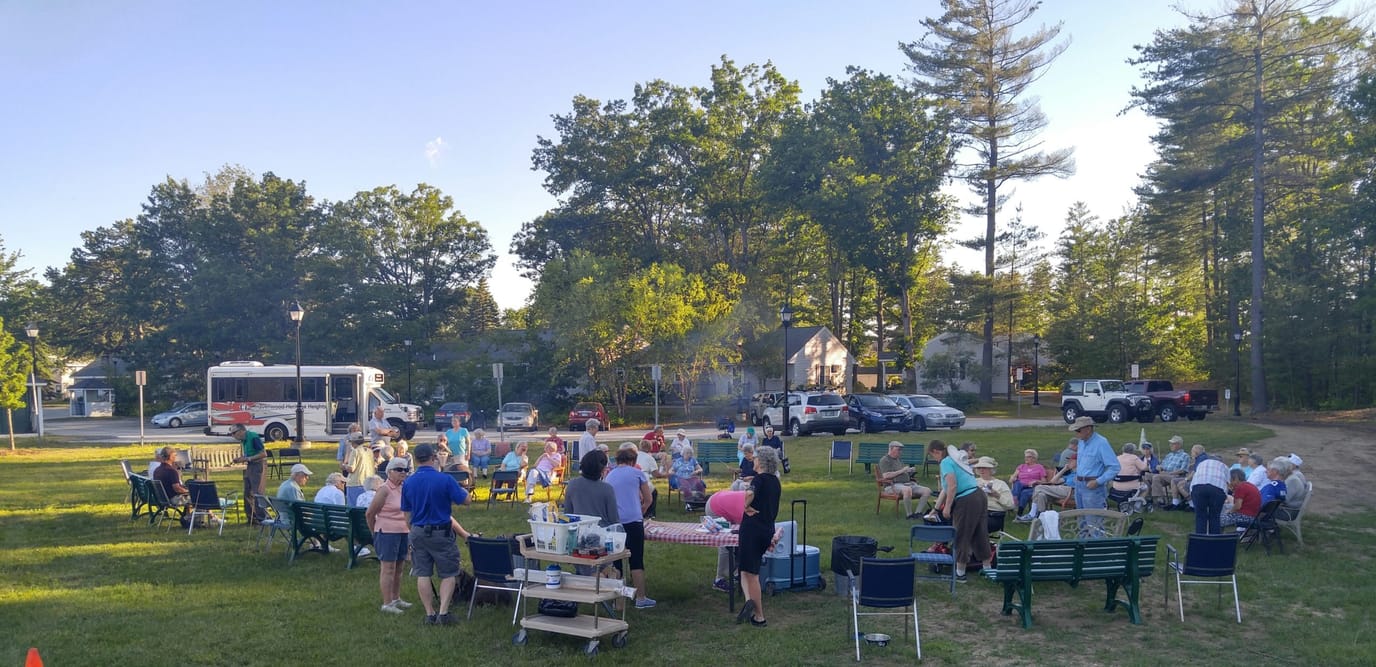 Heritage Heights, Nursing Home in Concord, NH — Residents enjoying an outdoor gathering with chairs and food