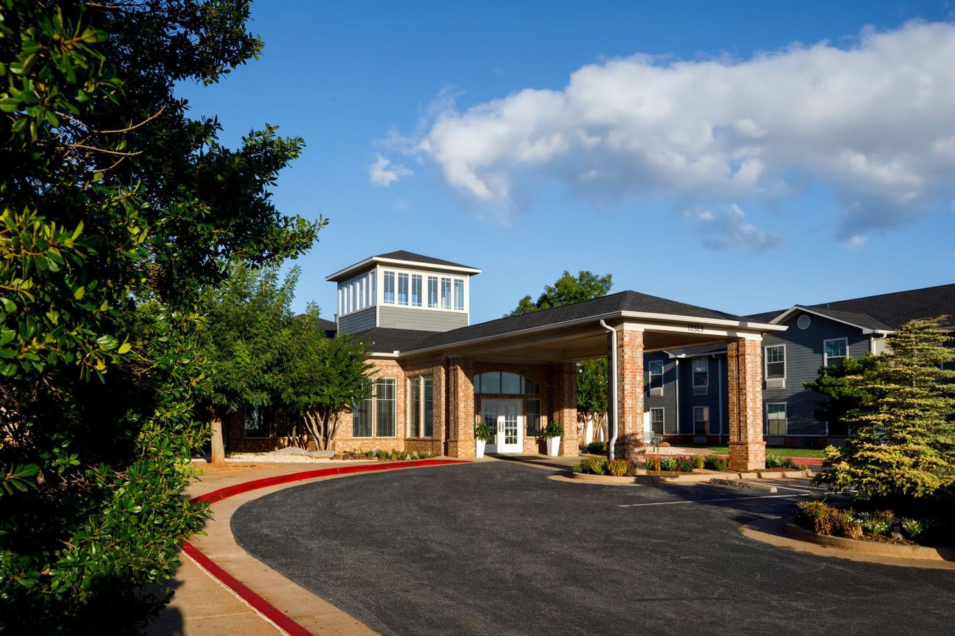 Facade view of a senior living facility entrance