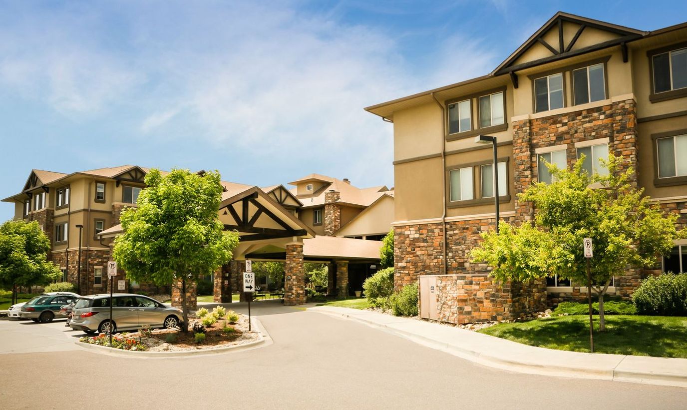 Beautiful exterior view of the facility with trees and architecture