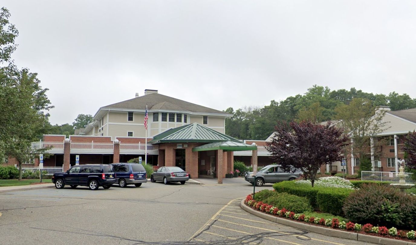 Front entrance of FountainView at College Road with landscaping