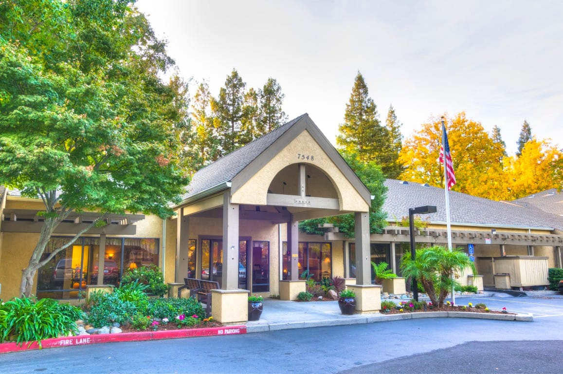 Building exterior of Greenhaven Estates with landscaping