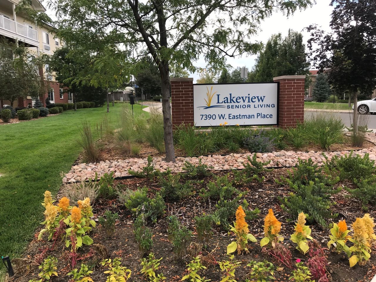 Sign at Lakeview Senior Living with landscaping