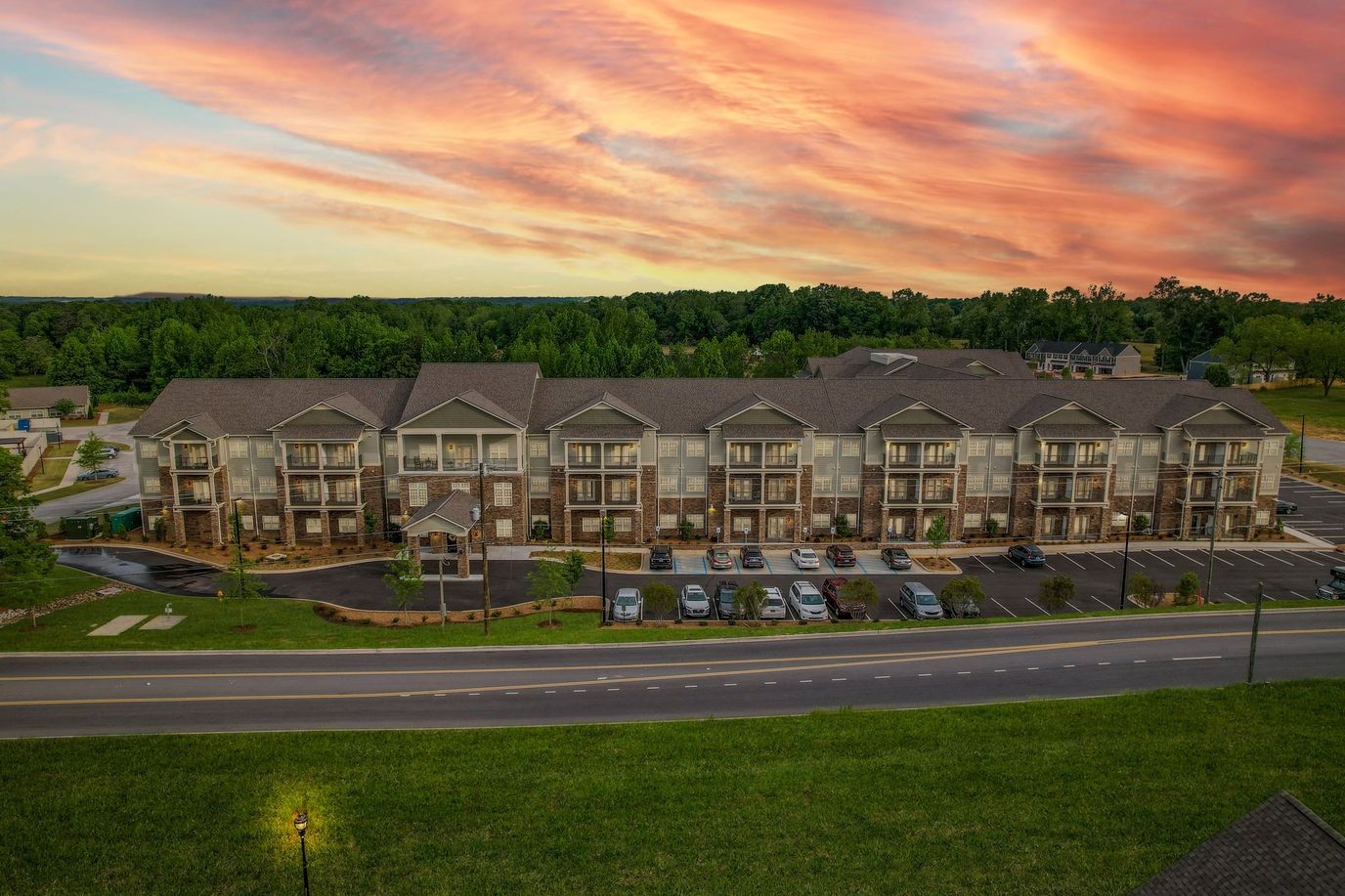 Aerial view of the facility building at sunset