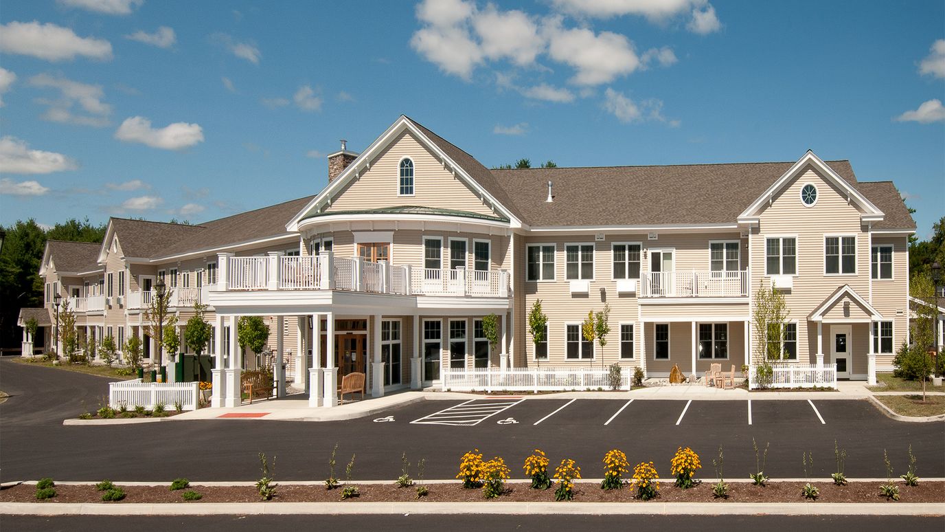Exterior view of Ross Manor with landscaping and parking