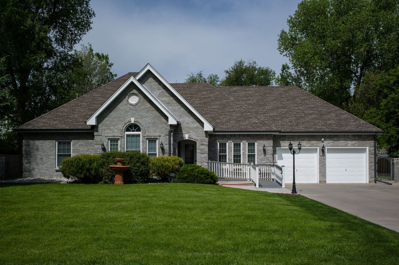 Exterior view of a residential facility with a lawn