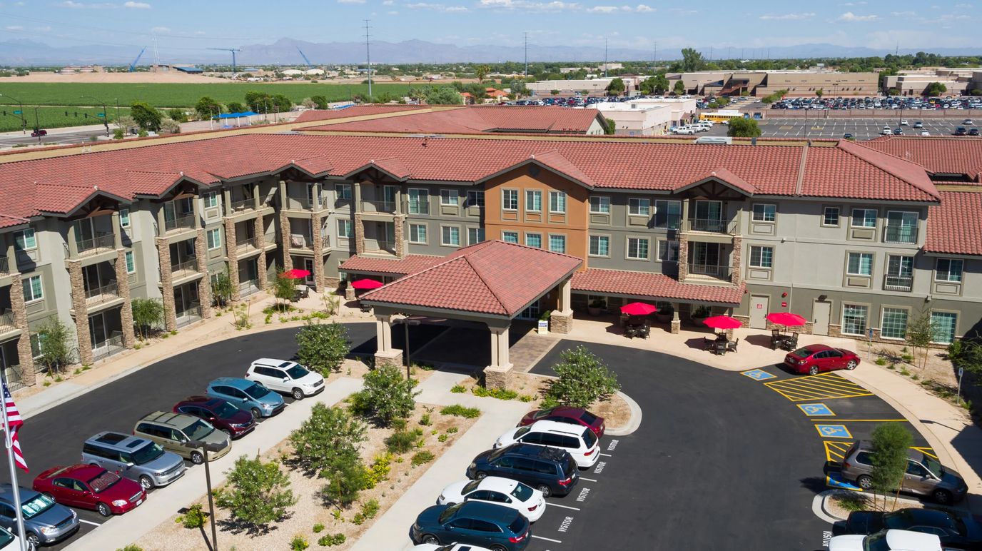 Aerial view of a senior living facility with outdoor seating