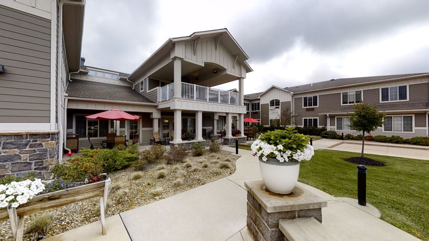 Exterior view of The Enclave of Newell Creek with gardens