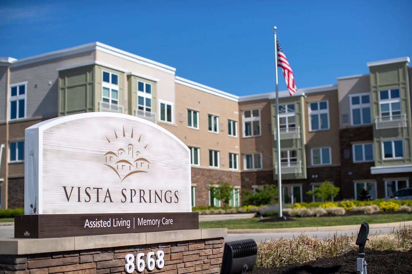 Exterior view of Vista Springs Greenbriar with signage