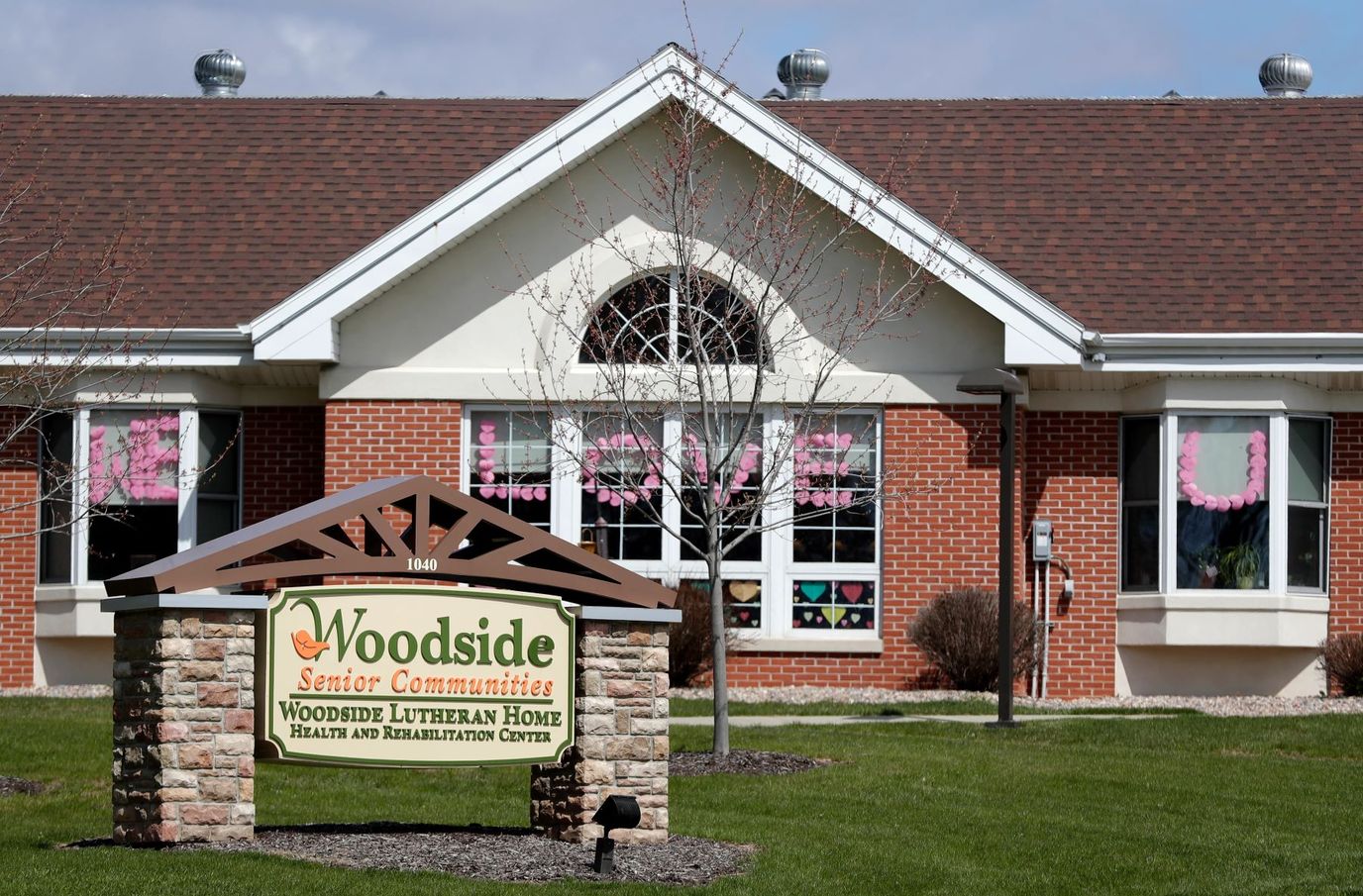 Exterior view of Woodside Lutheran Home with colorful decorations