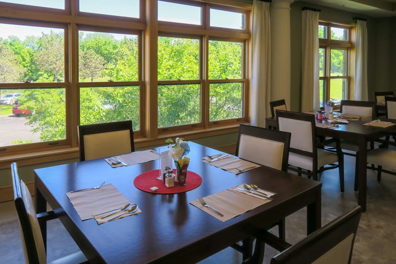 Dining room with large windows and tables