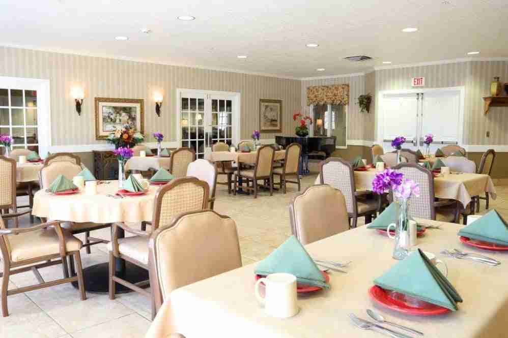 Mill Creek Alzheimer‘s Special Care Center, memory care in Springfield, IL — Dining area with tables set for a meal