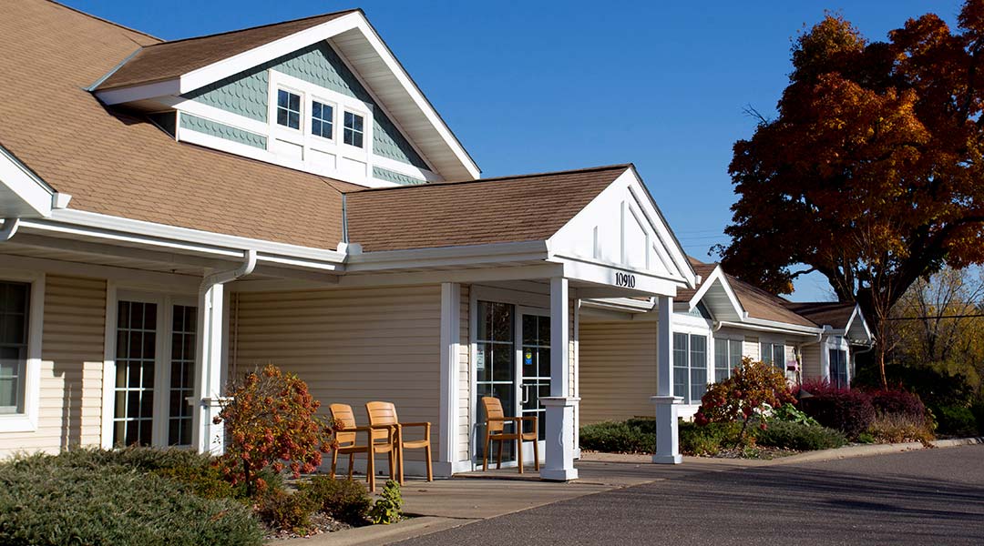 Exterior view of the facility with landscaping