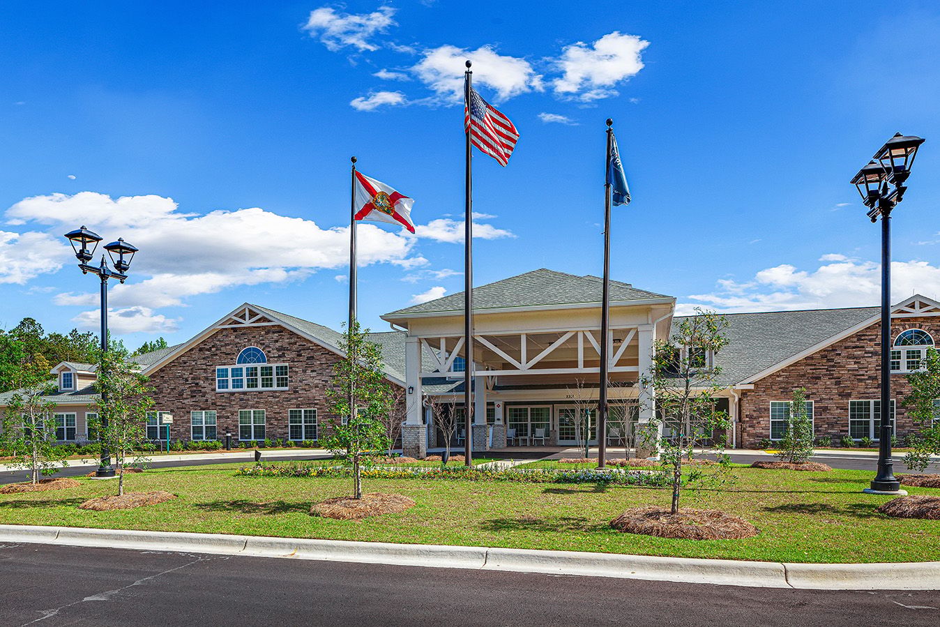 Exterior view of the assisted living facility with landscaping