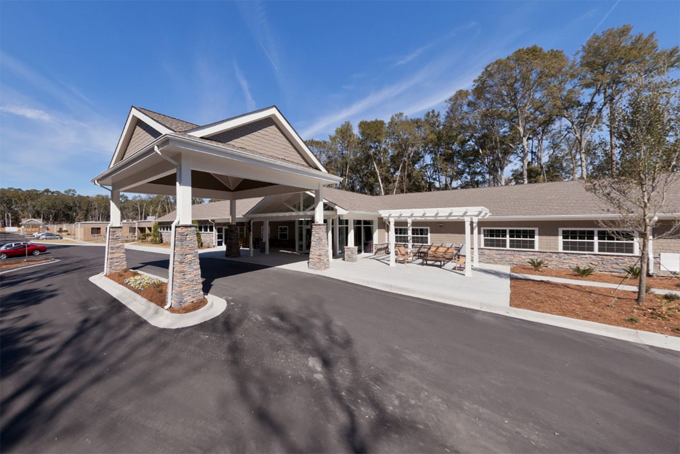 Exterior view of the facility entrance with landscaping