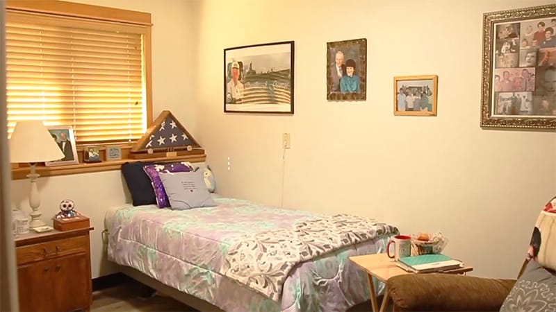 Cozy resident room with personal touches and decorations