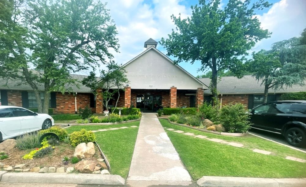 Exterior view of the facility entrance with landscaping