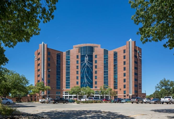 CHI Health St. Francis, Nursing Home in Grand Island, NE — Modern senior living facility with a landscaped parking area