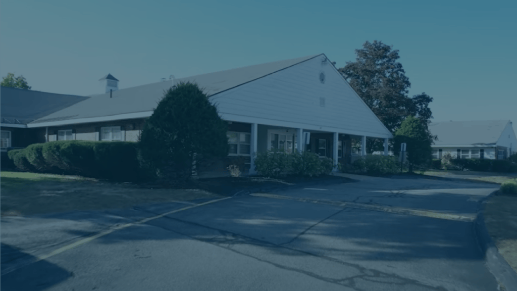 Exterior view of the Dover Center building and landscape