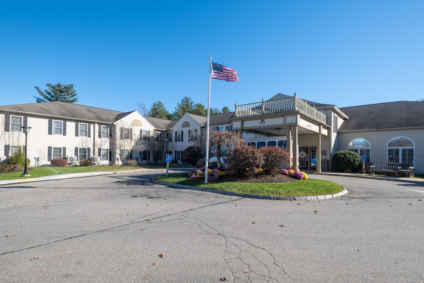 Exterior view of Benchmark Senior Living at Nashua entrance