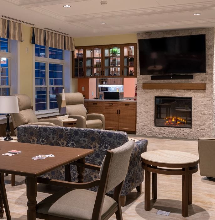 Common area with seating and a fireplace