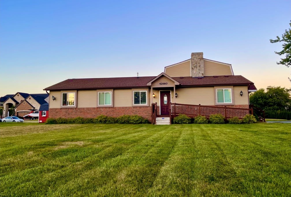Exterior view of a well-maintained assisted living facility